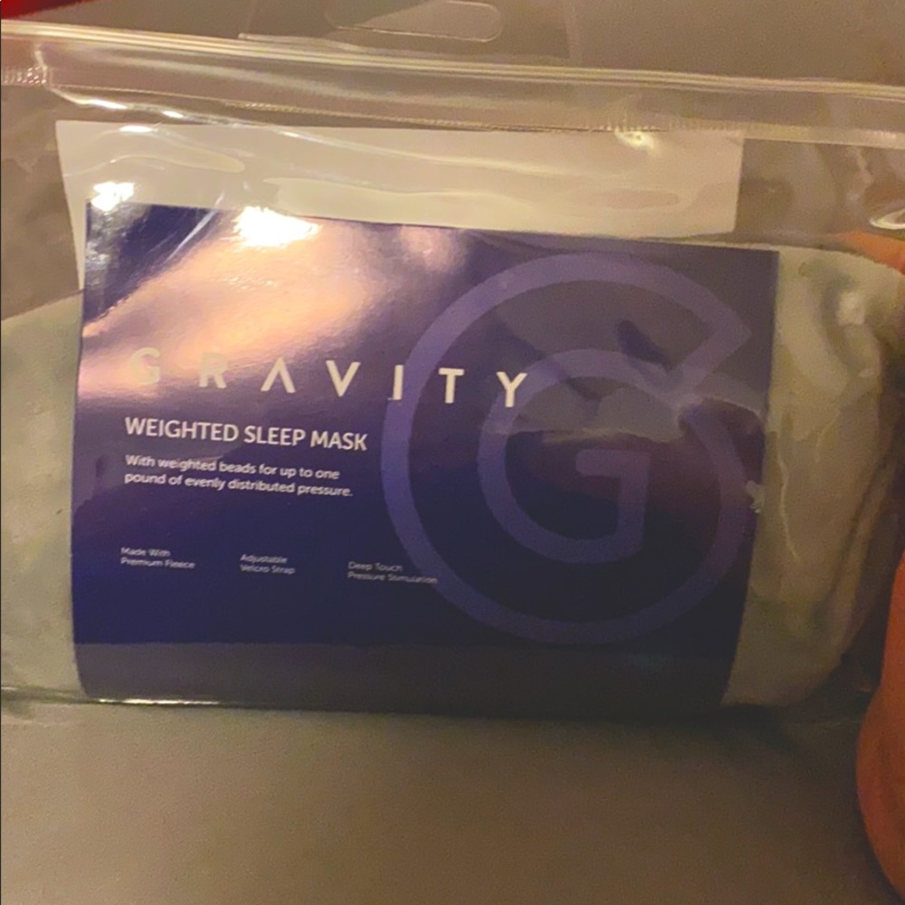 Gravity weighted sleep mask